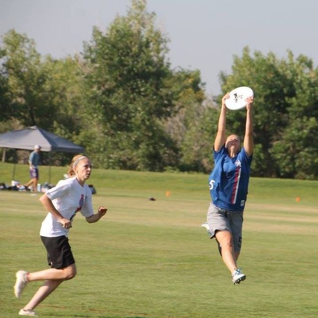 A leaping catch during an Ultimate Frisbee game