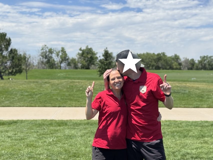 Wendy celebrating at an Ultimate Frisbee tournament