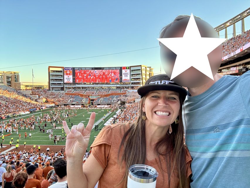 Wendy at a Texas Longhorns football game in Austin